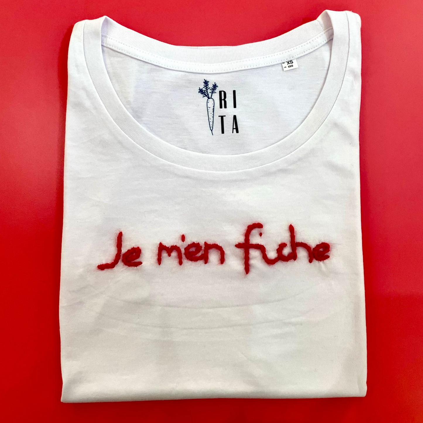 T-Shirt bianca "Je m'en fiche"